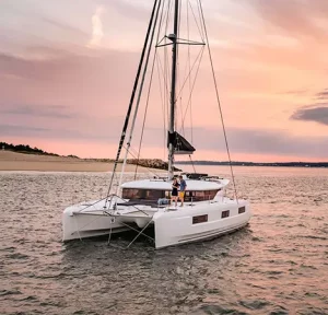 Zalina Lagoon 46 sailing catamaran anchored at sunset