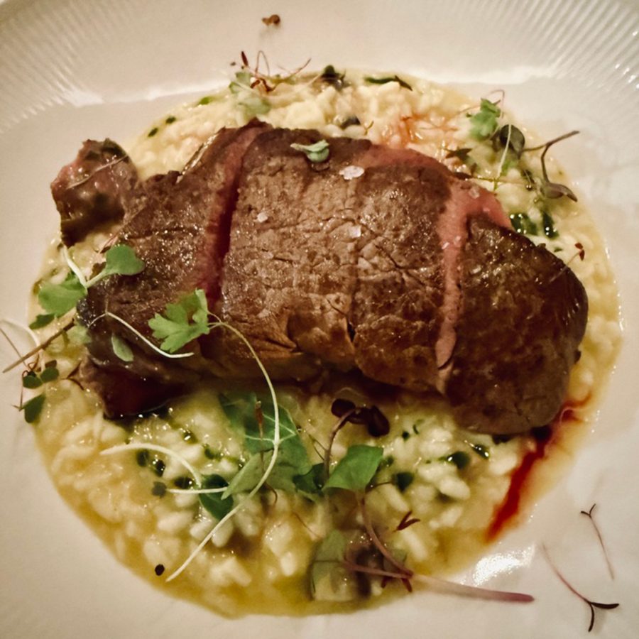 Gourmet steak dish served aboard Ad Astra FP 80