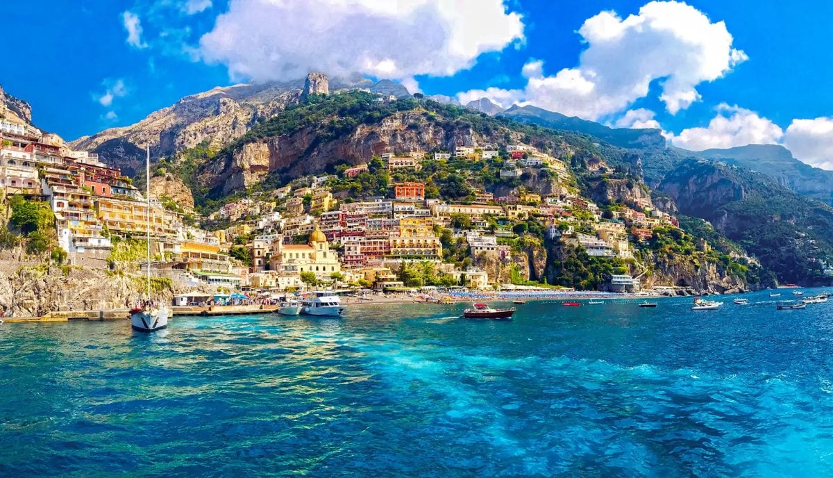 Colorful cliffside town on the Amalfi Coast viewed from the sea.