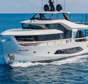 Ferretti motor yacht TRILOGY cruising in Italy with modern design and glass-panel superstructure.