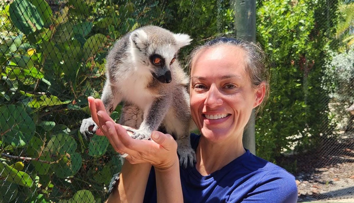 Guest with a lemur during a Necker Island tour, Virgin Gorda BVI