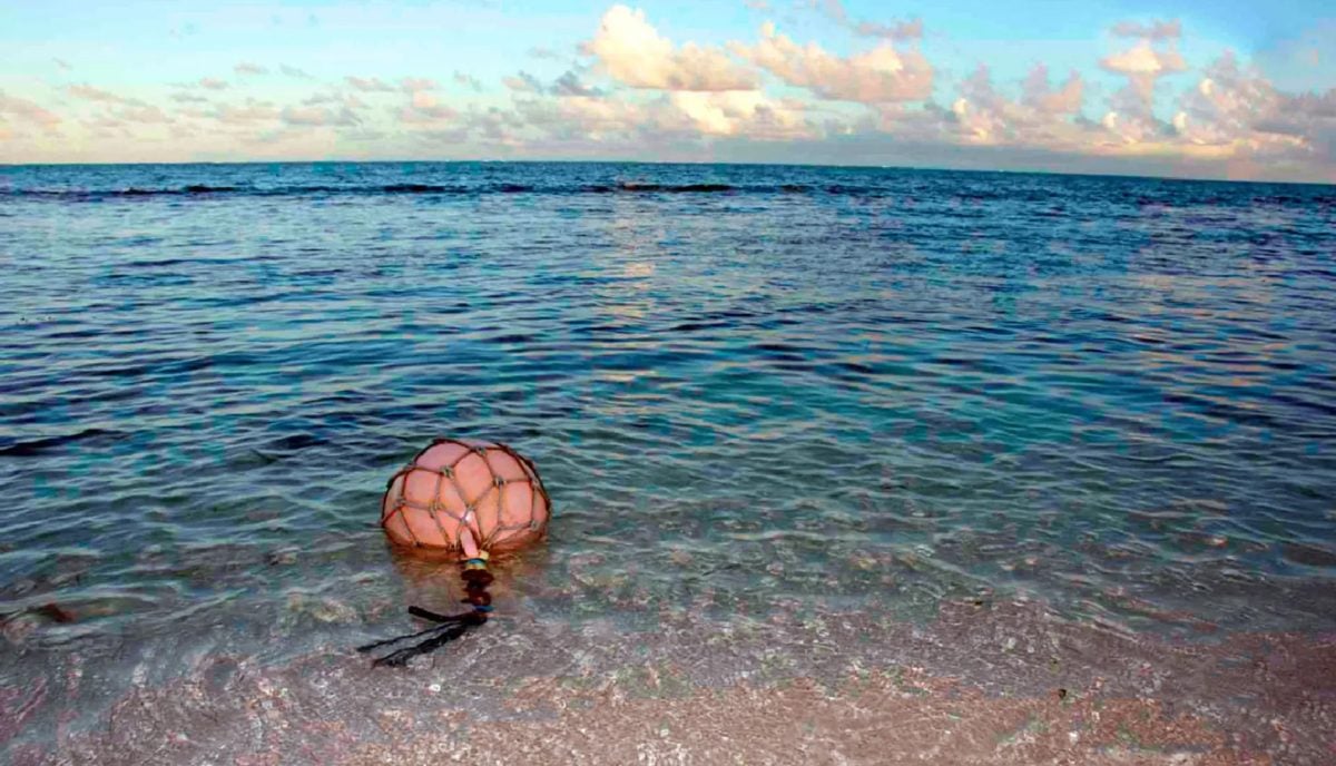 Vintage glass fishing float found beachcombing on the southeast shore of Anegada BVI