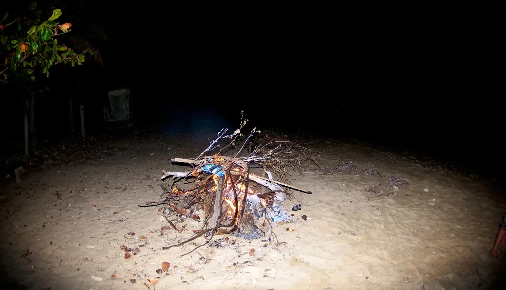 Beach bonfire on a white sand beach in Tortola, BVI