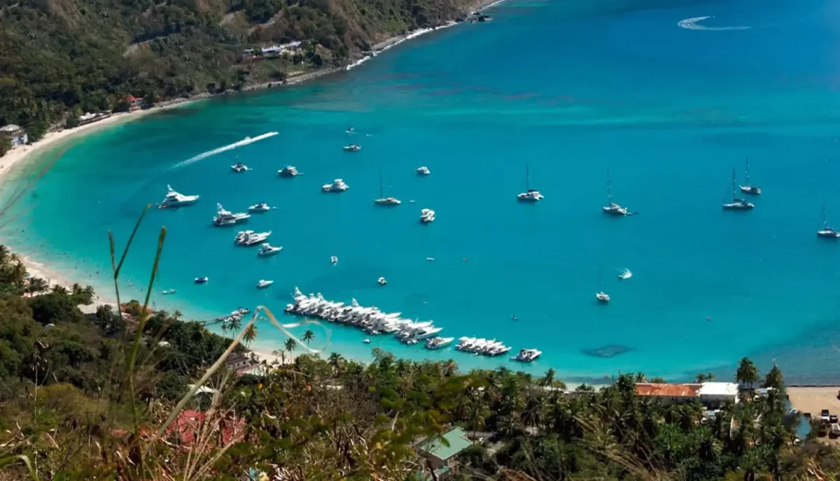 Aerial view of Cane Garden Bay, Tortola BVI, with yachts at anchor in turquoise water