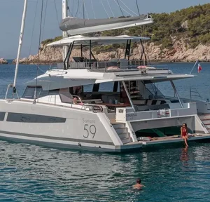 NEHALENNIA Fountaine Pajot Samana 59 crewed charter catamaran at anchor in the Virgin Islands
