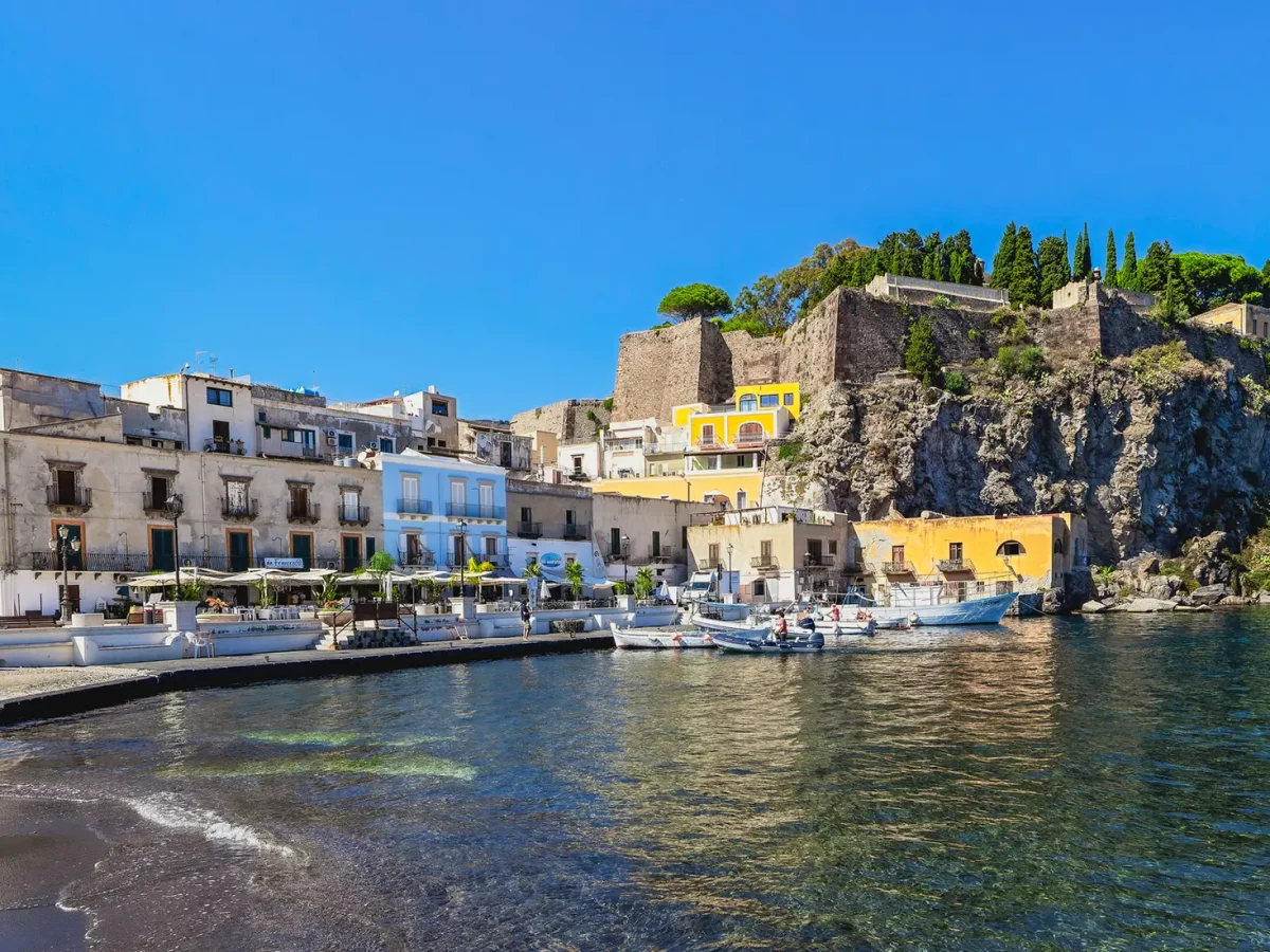 Lipari Aeolian Islands Sicily Motor Yacht Island Hopping Lipari Marina Corta harbor with castle fortress Aeolian Islands Sicily