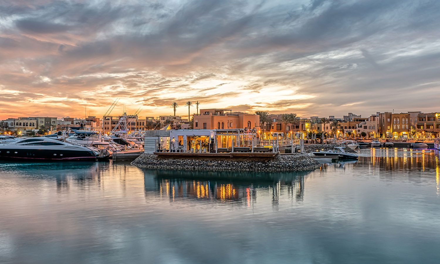 El Gouna marina at sunset Egypt Red Sea yacht charter base with waterfront dining and modern facilities